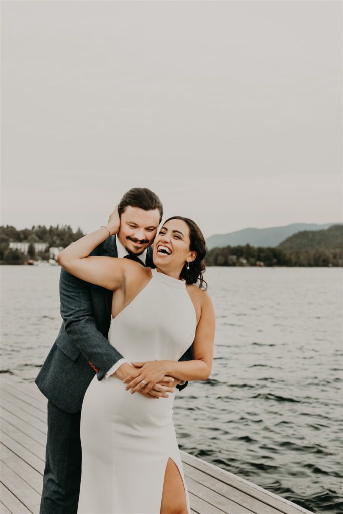 bride and groom on dock