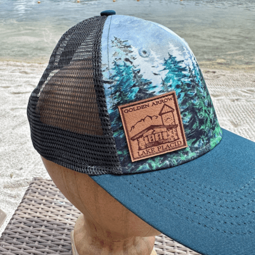 Wear your love for the Adirondacks with this teal and charcoal Wildwoods Golden Arrow trucker hat