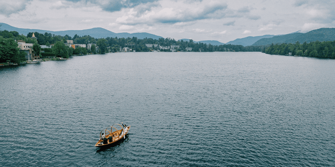 Take a ride around Mirror Lake on the Golden Arrow's Gondola